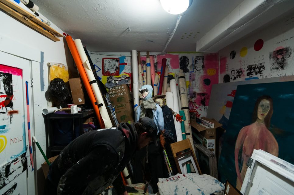 Crowded artist's studio showing how important storage for hobbyists is